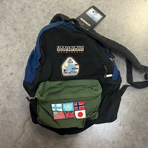 Napapijri Geographic Backpack with travel patches.
